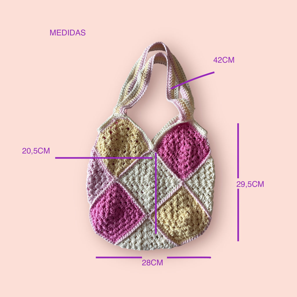 Bolso artesanal de crochet en tonos rosa y crema, estilo boho chic