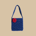 Bolso crochet azul — asa recta, fondo beige