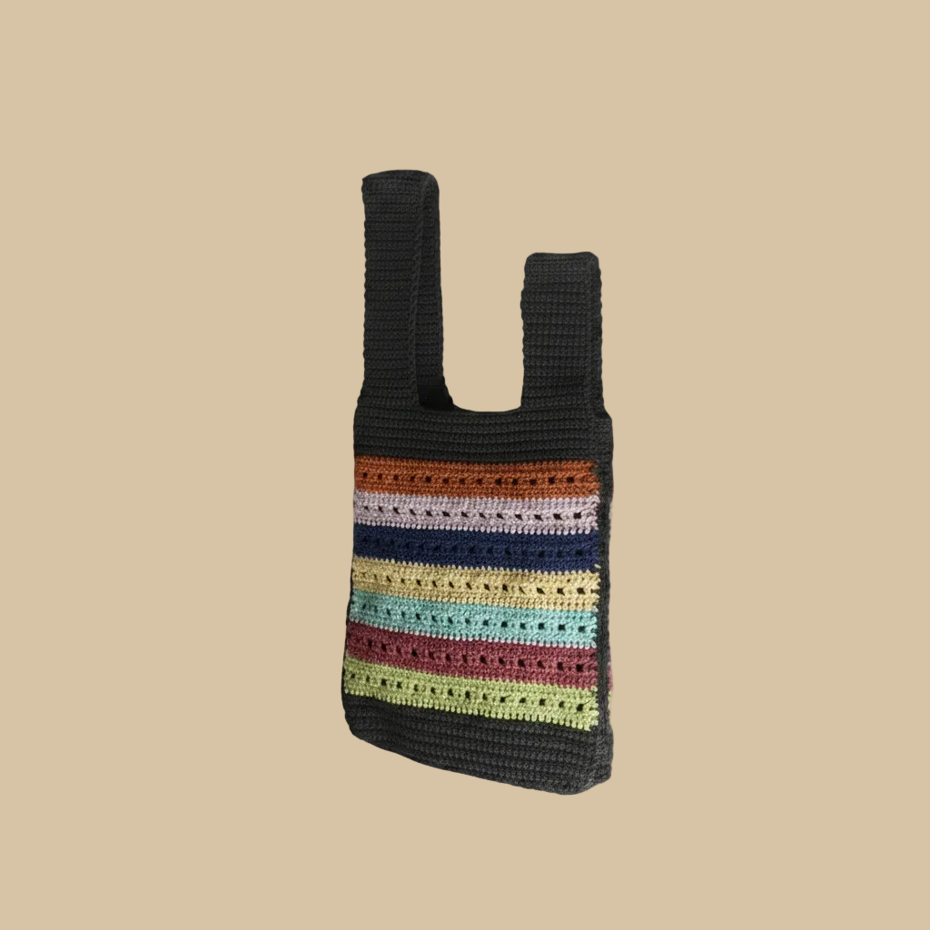 Bolso crochet multicolor — girado a la izquierda