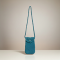 Crochet teal bag with straight strap