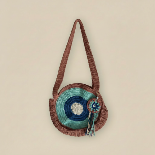 Straightened crochet round bag on beige